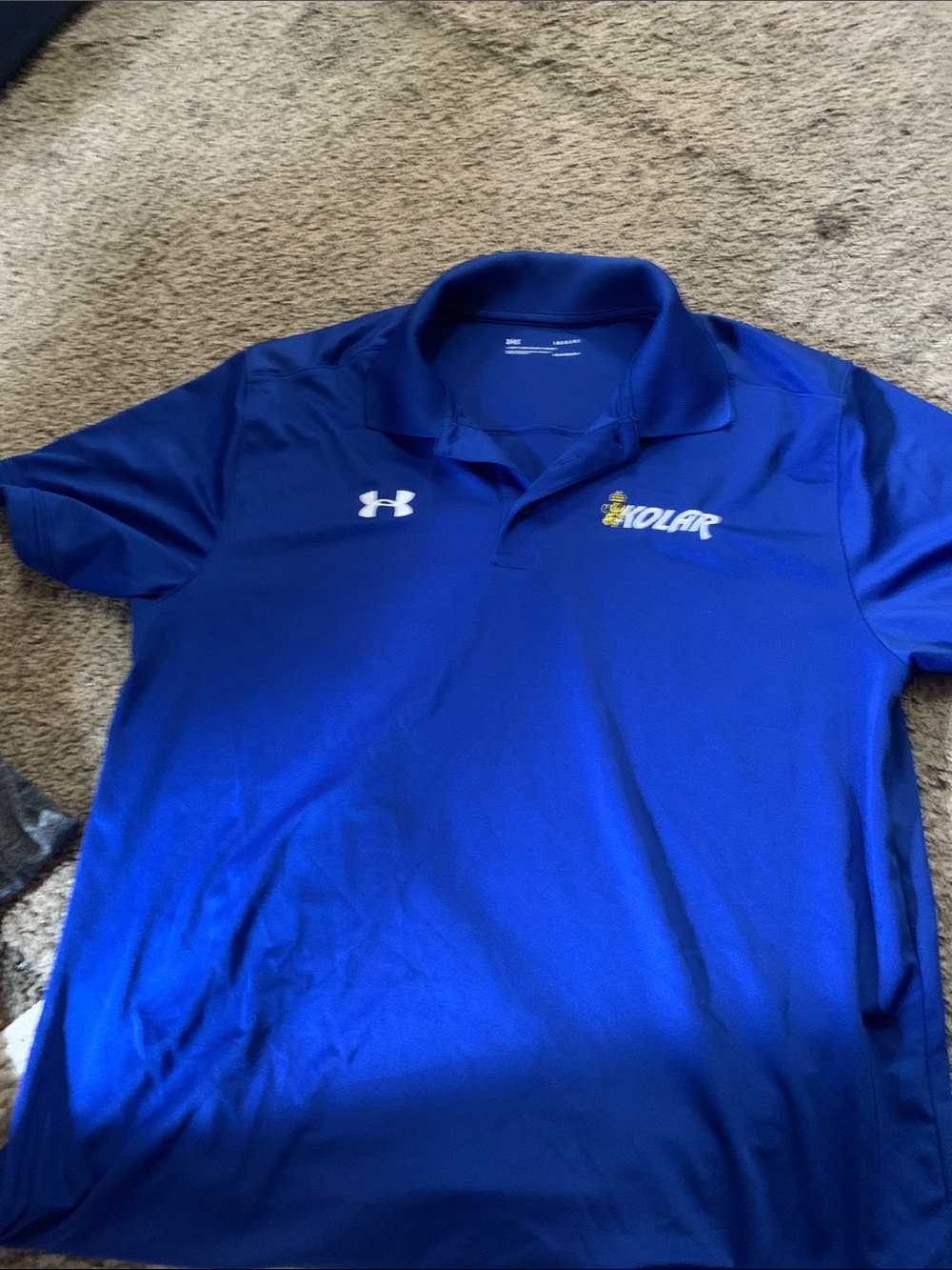 Under Armour Blue Kolar Embroidered Polo Kolar is a Wisconsin gunsmith.